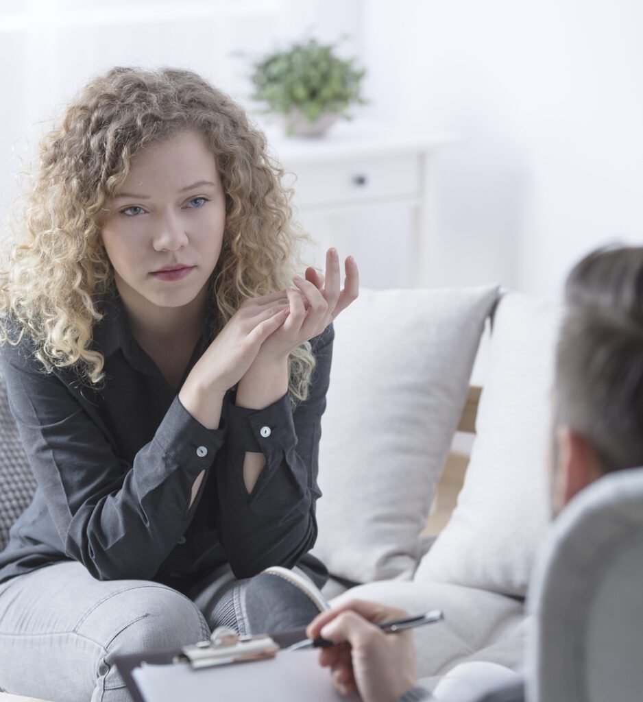 woman talking with her therapist