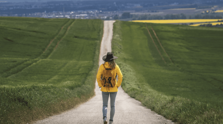A person standing on a road.