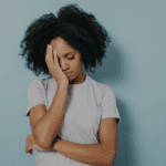 A woman looking disappointed.