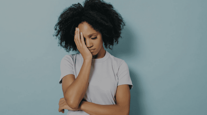 A woman looking disappointed.