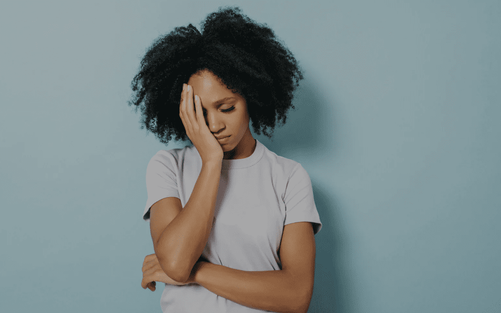 A woman looking disappointed.
